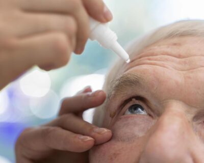 doctor-pouring-some-eye-drops-patient-1