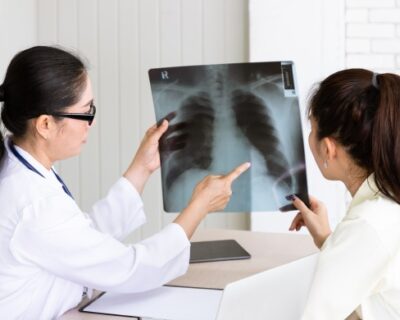 medical-doctor-give-consultation-patient-with-xray-film-1