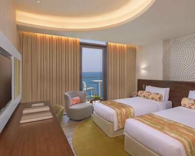 2_DELUXE-ROOM-Two-Single-Beds-Partial-Sea-View_b