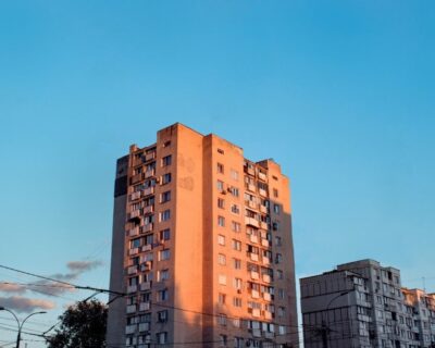 aged-apartment-houses-sunset-with-blue-sky-1