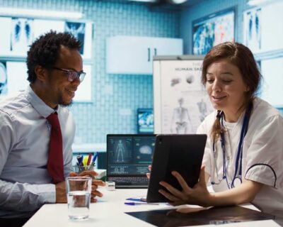 medical-specialist-explaining-diagnostic-test-results-cabinet-1