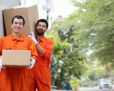 young-delivery-men-moving-parcel-boxes-1