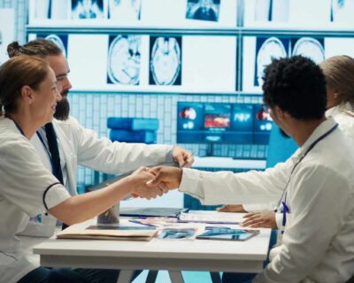 medical-experts-analyze-radiography-scans-meeting-with-staff-90kb