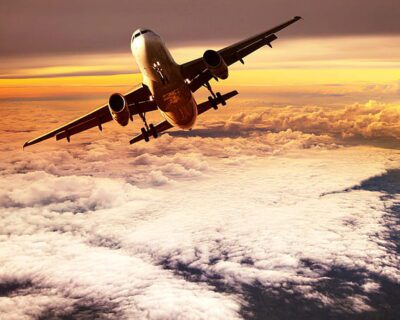 passenger-plane-flying-on-clouds-top-wallpaper-preview