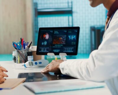 physician-meeting-with-patient-discuss-medical-test-results-cabinet-90kb