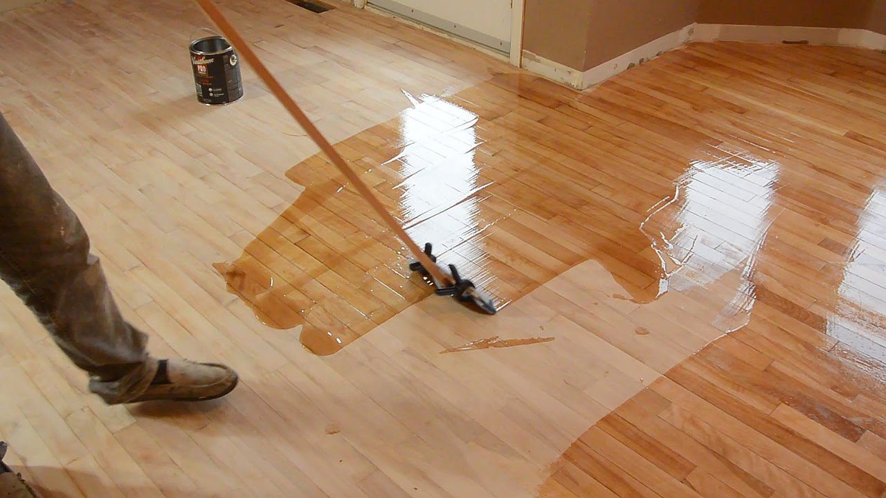 Restore Floor Shine with Wood Floor Recoating Service