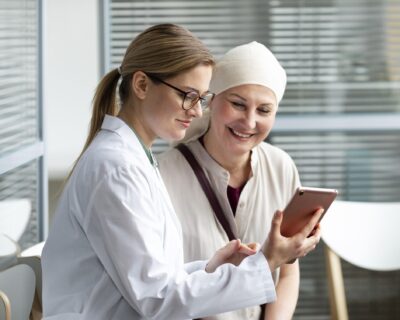 middle-aged-woman-with-skin-cancer-talking-with-her-doctor_1_optimized_1000